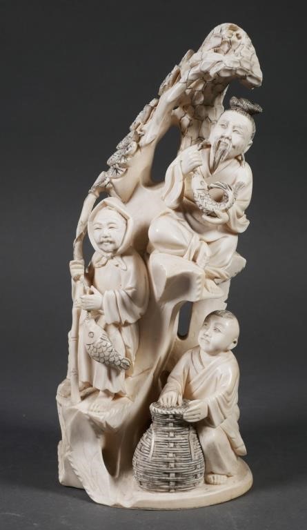 Appraisal: Antique Chinese carved ivory statue depicting a fishing family Measures