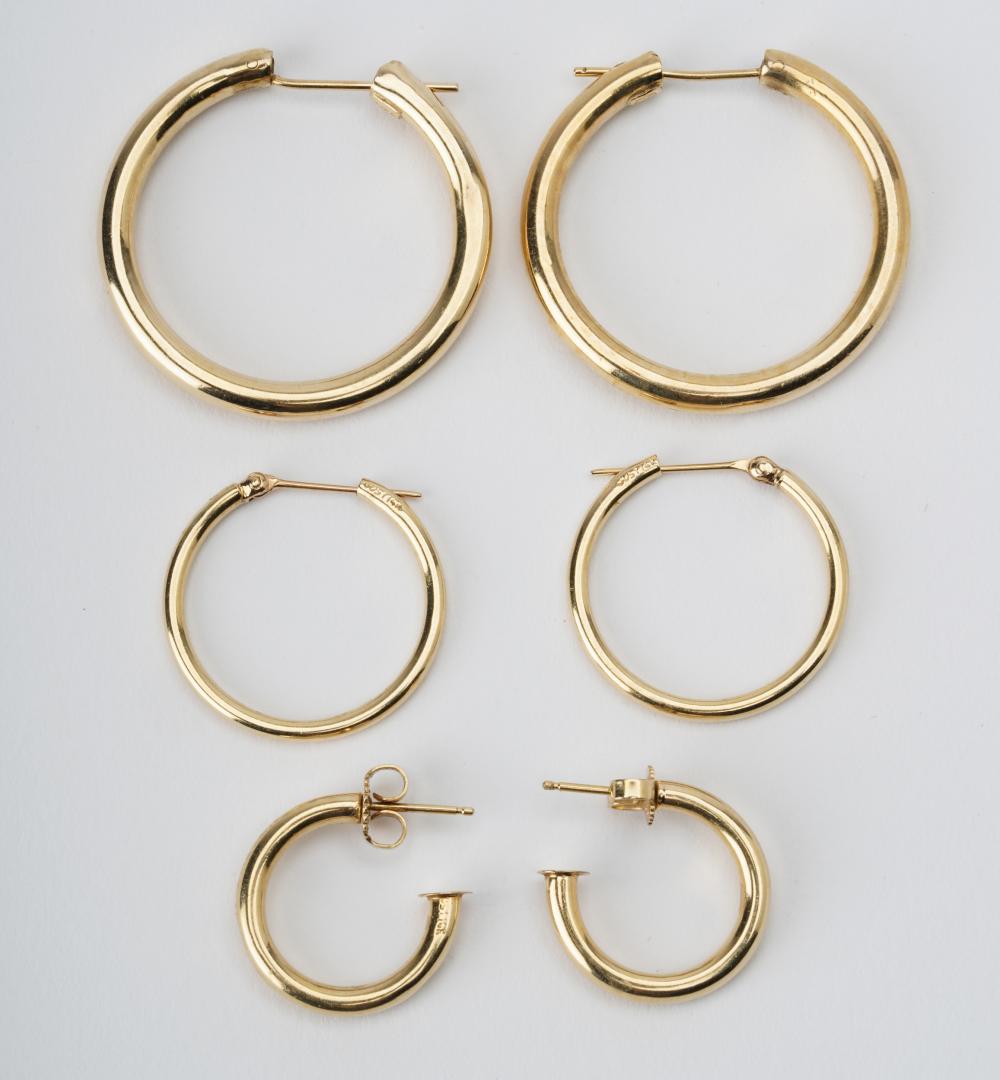 Appraisal: THREE PAIRS OF YELLOW GOLD HOOP EARRINGScomprising one pair measuring