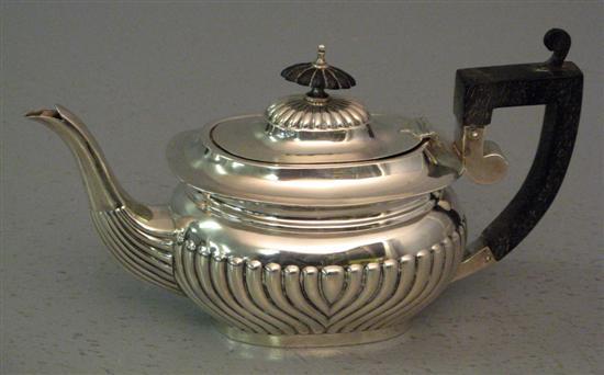 Appraisal: Edward VII silver oval teapot with half gadrooned body and