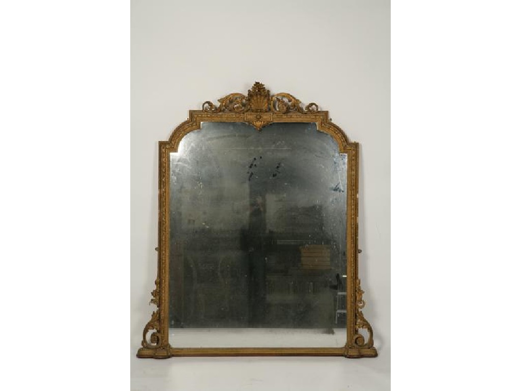 Appraisal: A VICTORIAN OVERMANTEL MIRROR the arched top plate within an