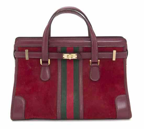 Appraisal: A Gucci Red Suede Bag Stamped Gucci x inches