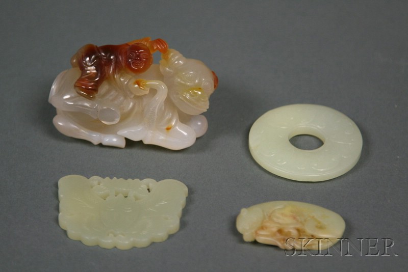 Appraisal: Four Carvings China an agate boy on a water buffalo