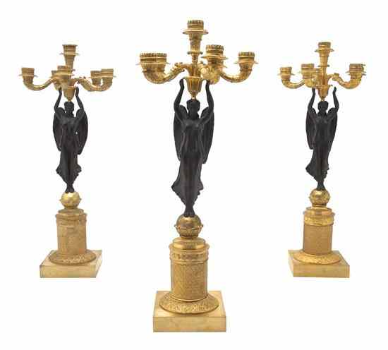 Appraisal: A Set of Three Empire Style Gilt and Patinated Bronze