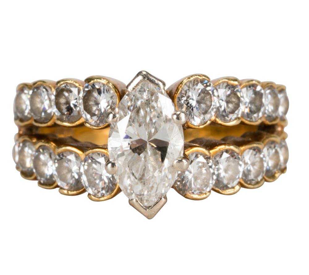 Appraisal: KARAT YELLOW GOLD DIAMOND RINGcentering one marquise-shape diamond I-J VS