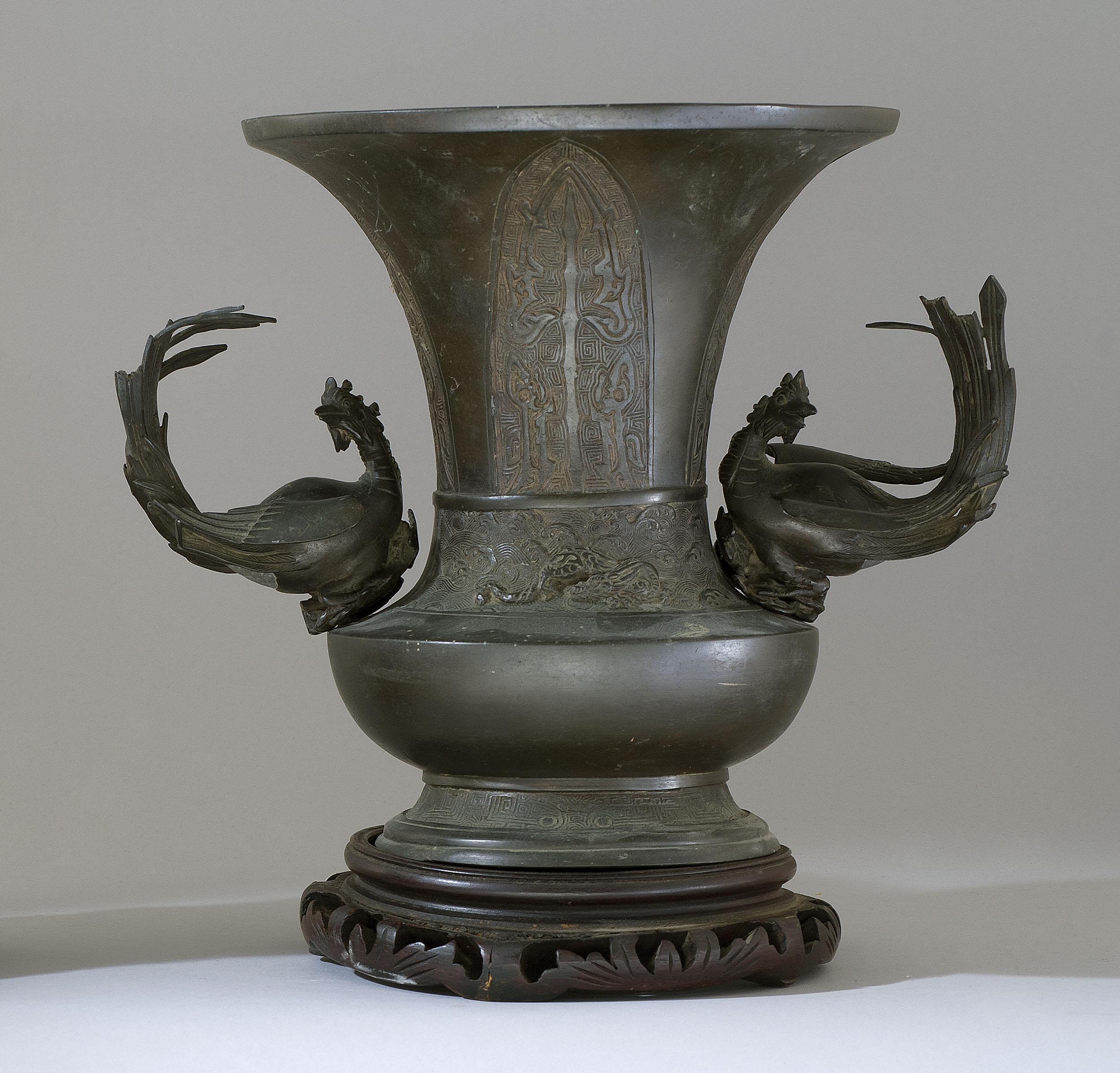 Appraisal: BRONZE VASE Early Meiji PeriodIn trumpet form with exotic bird