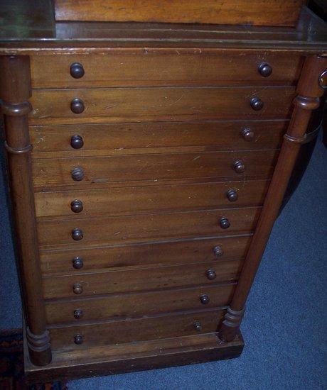 Appraisal: A collector's mid th Century walnut chest fitted ten graduated