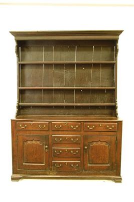 Appraisal: A late th century oak dresser the associated canopied top