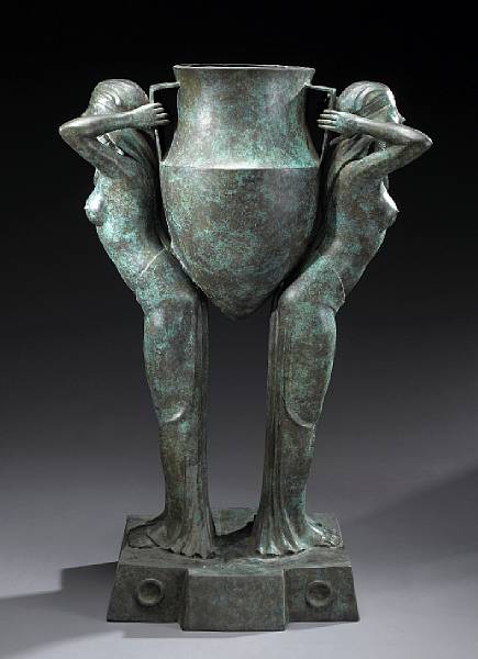 Appraisal: An Art Deco Style patinated bronze figural jardini re in