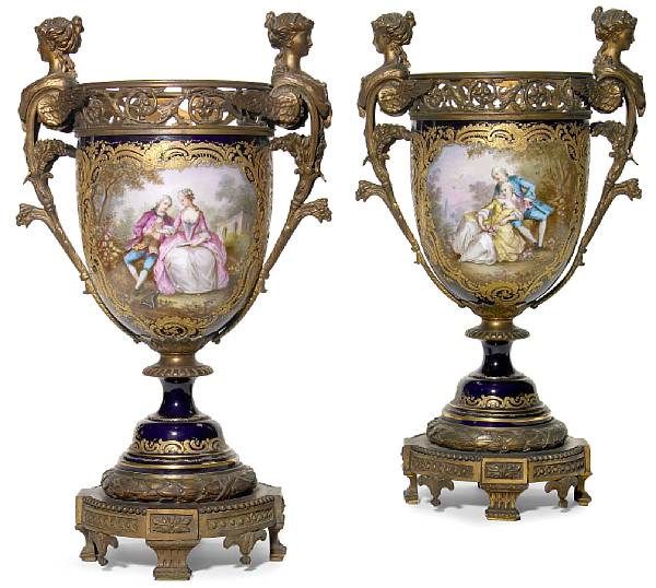 Appraisal: A pair of S vres style porcelain gilt bronze mounted