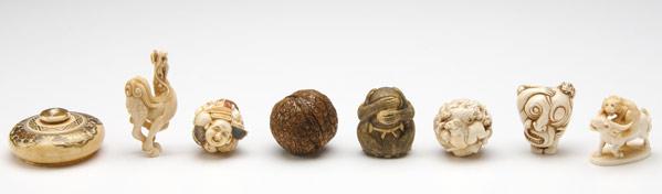 Appraisal: JAPANESE IVORY NETSUKE Eight pieces th- th C tiger attacking