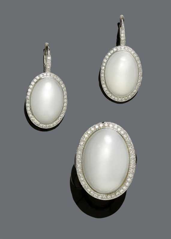 Appraisal: MOON STONE AND DIAMOND RING AND PENDANT EARRINGS White gold