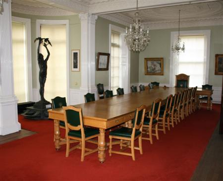 Appraisal: A large oak board room table By Wyle Lockhead Ltd