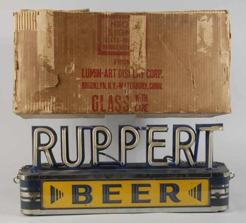 Appraisal: Rupert Beer Light-Up Sign Description Working Includes original box Condition