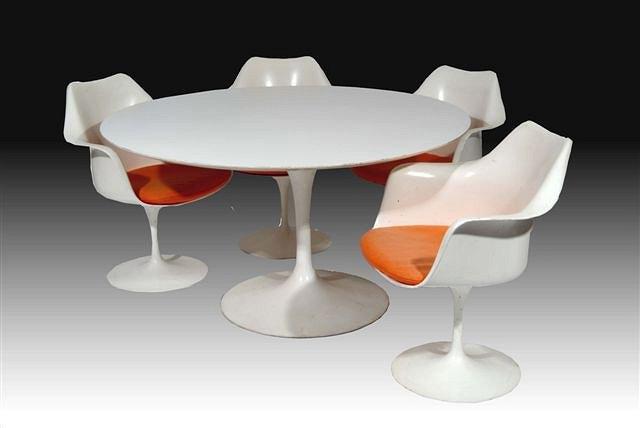 Appraisal: AN EERO SAARINEN 'S WHITE FIBREGLASS AND ALUMINIUM DINING ROOM