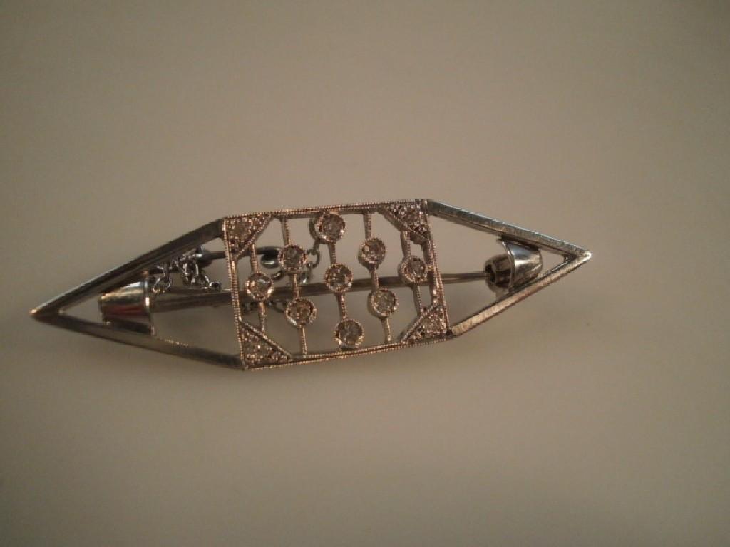 Appraisal: An Art Deco diamond set lozenge shape brooch in white