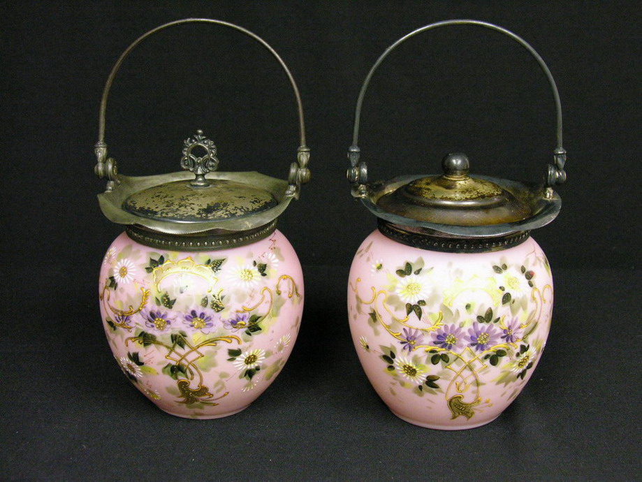 Appraisal: PAIR OF ENAMELLED BISQUIT JARS Floral decor in gold and