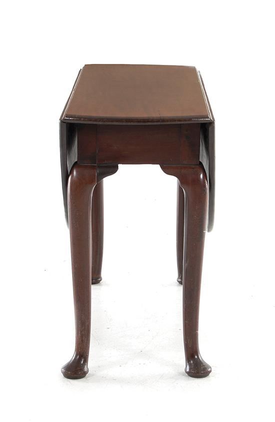 Appraisal: George III mahogany drop-leaf table circa oval drop-leaf top on