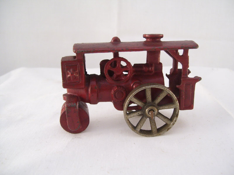 Appraisal: Cast Iron Steam Roller Original red paint No mark Measures