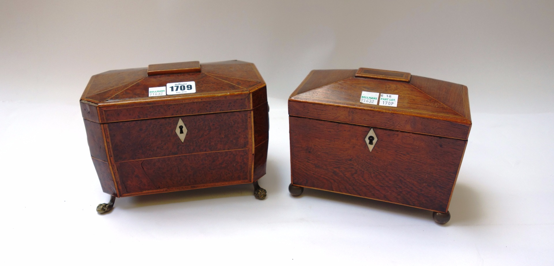 Appraisal: A Regency tulipwood banded burr yew sarcophagus tea caddy with