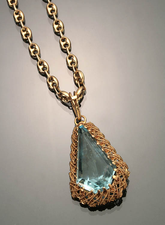 Appraisal: -Karat Filigree Yellow-Gold and Aquamarine Pendant Necklace The faceted tear-drop