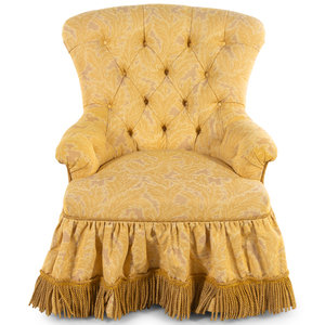 Appraisal: A Custom Button-Tufted Upholstered Armchair with Bullion Fringe th Century