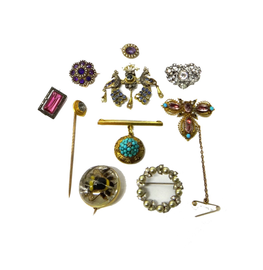 Appraisal: A gold amethyst and seed pearl set shaped circular brooch