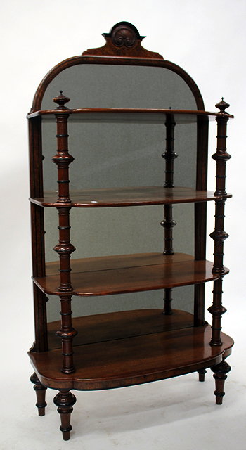 Appraisal: A VICTORIAN MAHOGANY AND WALNUT WHATNOT the mirrored back with