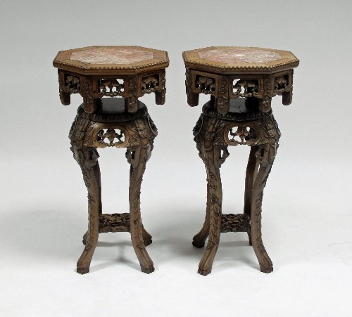 Appraisal: A pair of Chinese hardwood stands each inset with an