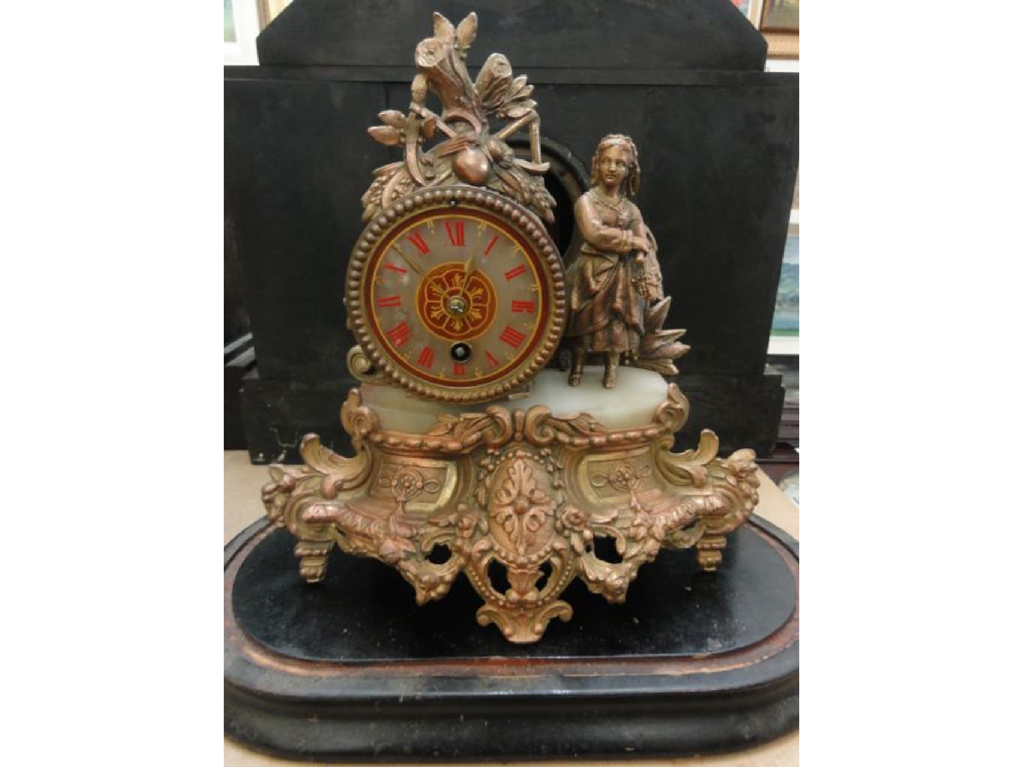 Appraisal: A Victorian spelter mantle clock in the romantic style the