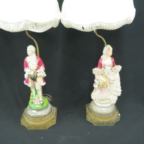 Appraisal: Pair of Chantilly Porcelain Figural Lamps colonial style man woman