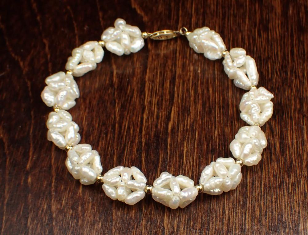 Appraisal: BAROQUE PEARL AND FOURTEEN KARAT GOLD BRACELET The bracelet with