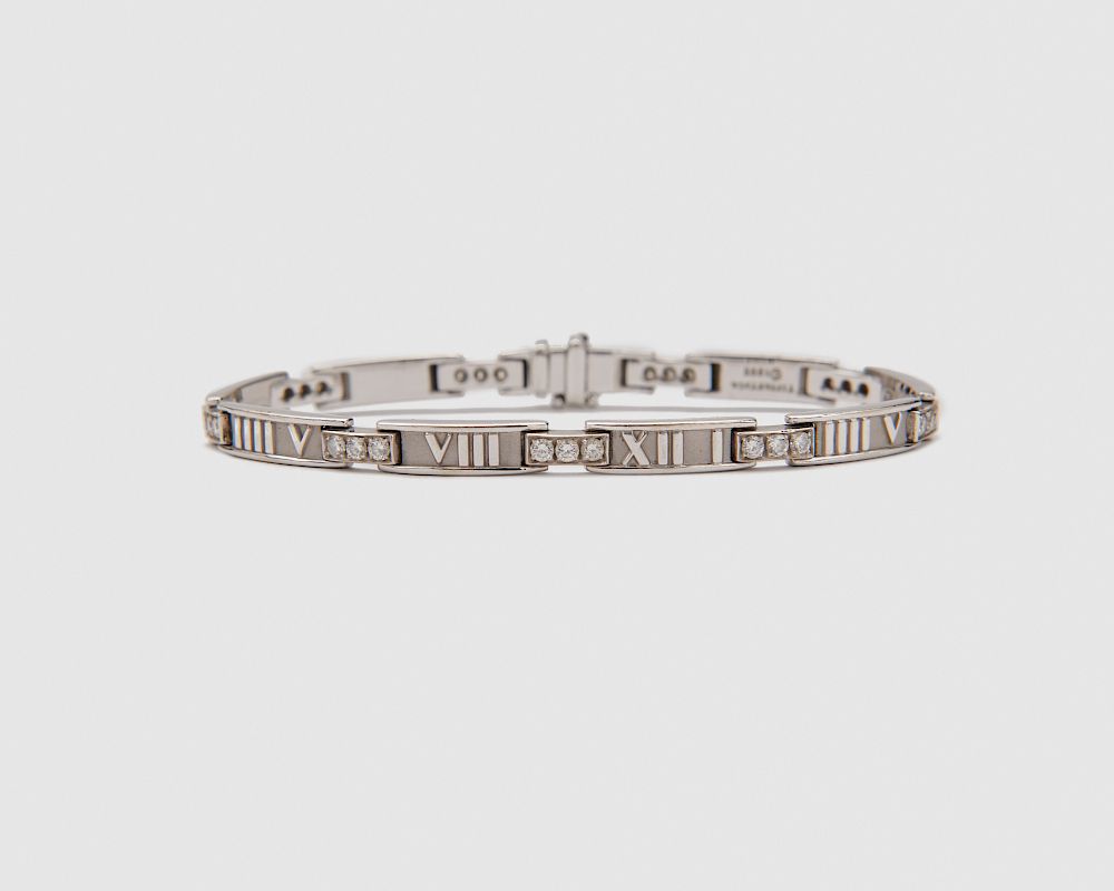 Appraisal: TIFFANY CO K Gold and Diamond Atlas Bracelet TIFFANY CO