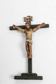 Appraisal: A Spanish Colonial Carved and Painted Crucifix Height inches A