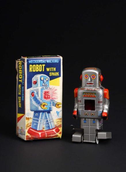 Appraisal: Robot with Spark Description Japanese Made by SY When in