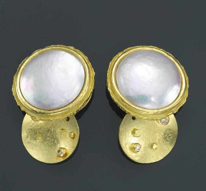 Appraisal: Property from a Boston Collector A pair of mab cultured