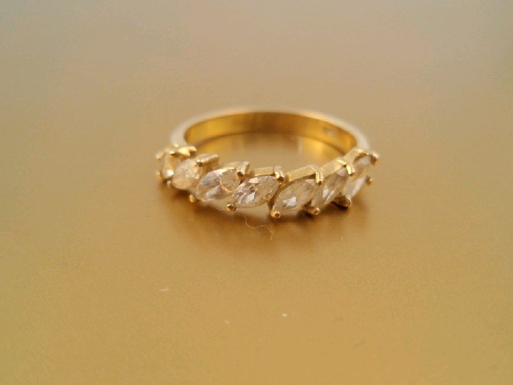 Appraisal: A marquise white stone set hoop eternity ring shank stamped