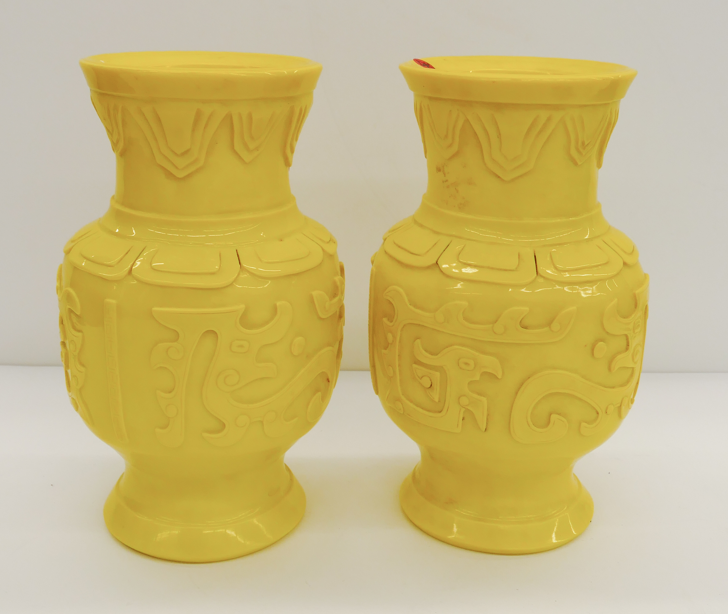 Appraisal: Pair Chinese Yellow Carved Peking Glass Archaic Vases- '' each