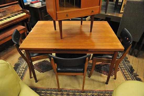 Appraisal: A 'S TEAK EXTENDING DINING TABLE WITH FOUR BLACK VINYL