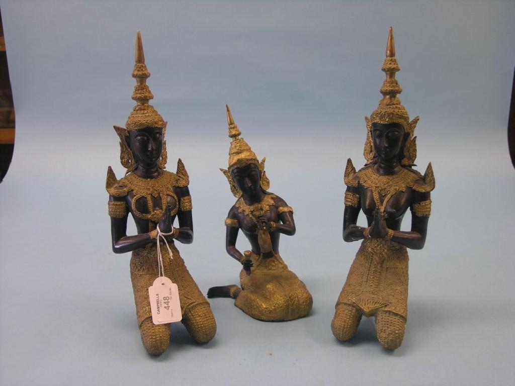 Appraisal: A group of three Tibetan bronzed and gilded metal figures