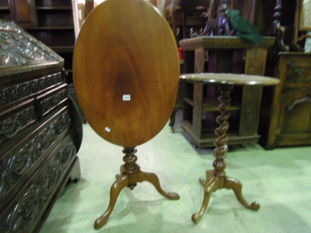 Appraisal: A Victorian mahogany tilt top occasional table of oval form