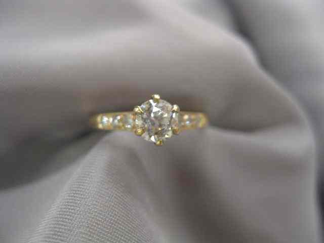 Appraisal: Diamond Ring center round diamond weighing carat with diamonds on