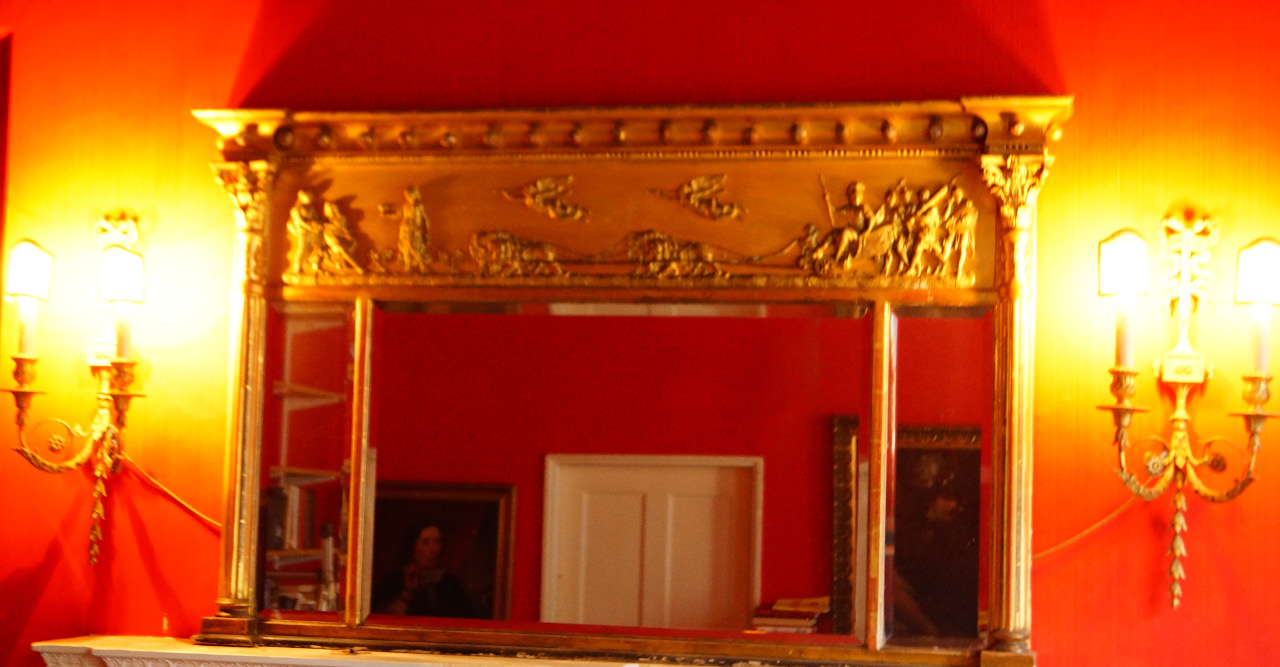 Appraisal: A mid thC gilt gesso overmantel mirror the crest decorated