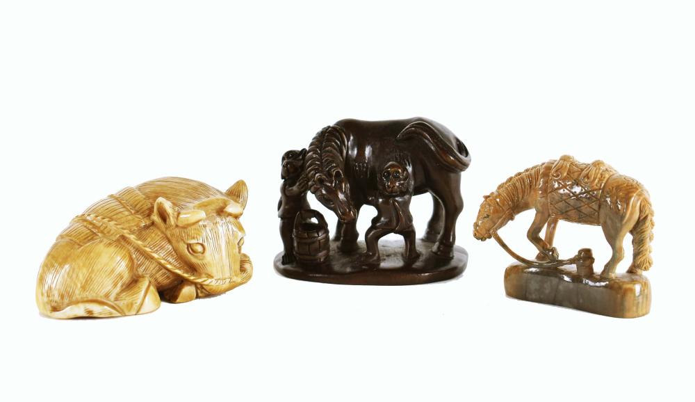 Appraisal: THREE ASIAN SMALL ANIMAL CARVINGSThe first a Japanese netsuke in