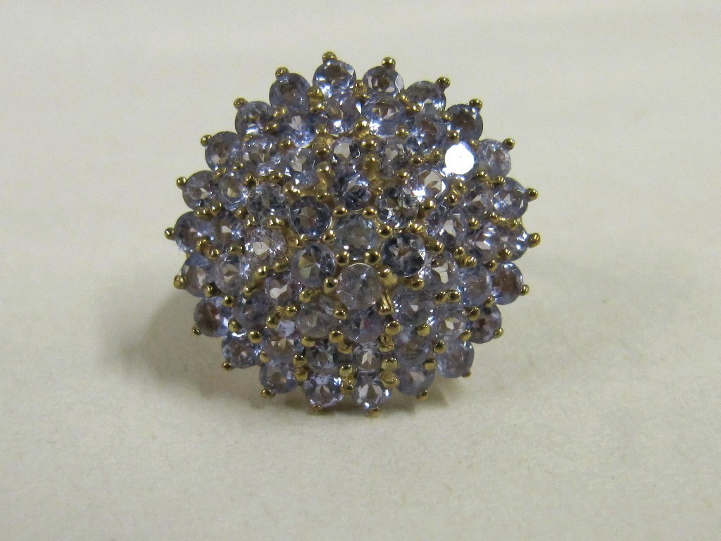 Appraisal: Nine carat gold tanzanite cluster ring