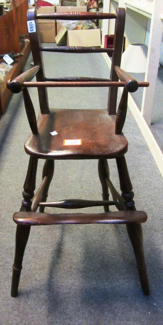 Appraisal: A th century stained beech and elm child's high chair