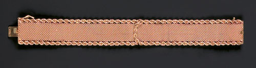 Appraisal: K yellow gold bracelet with mesh center and rope chain