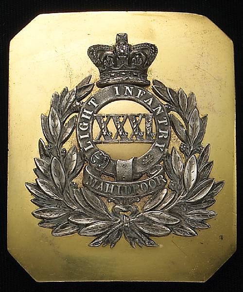 Appraisal: A Victorian officer's shoulder belt plate of the st Huntingdonshire