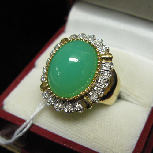 Appraisal: DIAMOND GREEN SERPENTINE QUARTZ AND FOURTEEN KARAT GOLD RING The