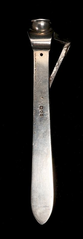 Appraisal: A LONDON STERLING SILVER CIGAR CUTTER With stamped hallmarks for