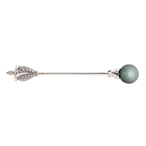 Appraisal: A diamond and black cultured pearl pin with larger navette